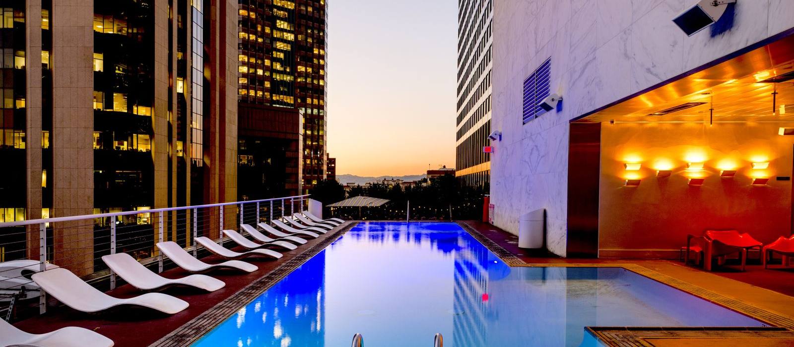 Swimming pool at dusk at the end of the season